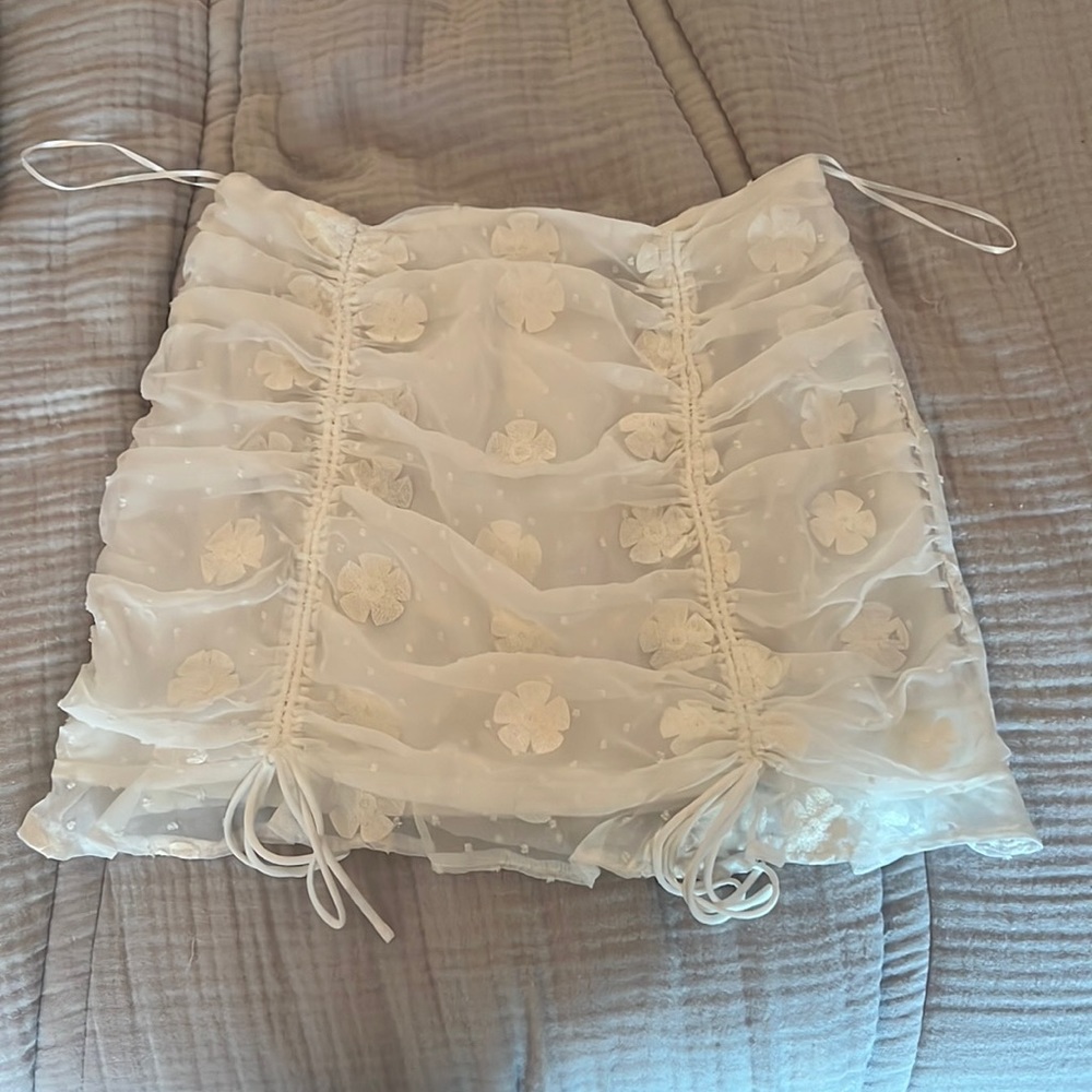 White mini skirt